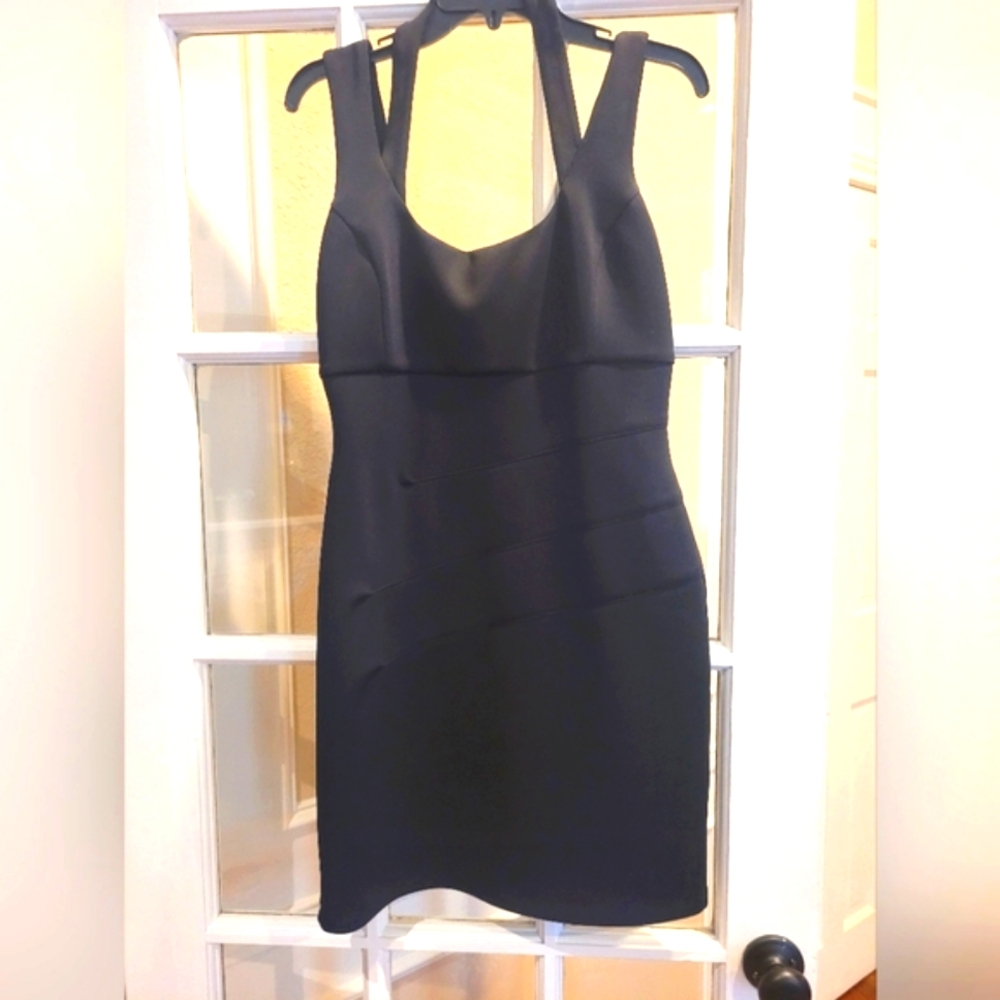 Guess mini dress with gold zipper in back.  Size 8/10.